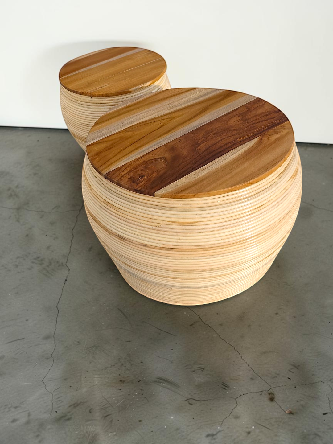 AYOMI set of two handmade round coffee tables with bamboo bases and natural teak wood tops for indoor or outdoor use.