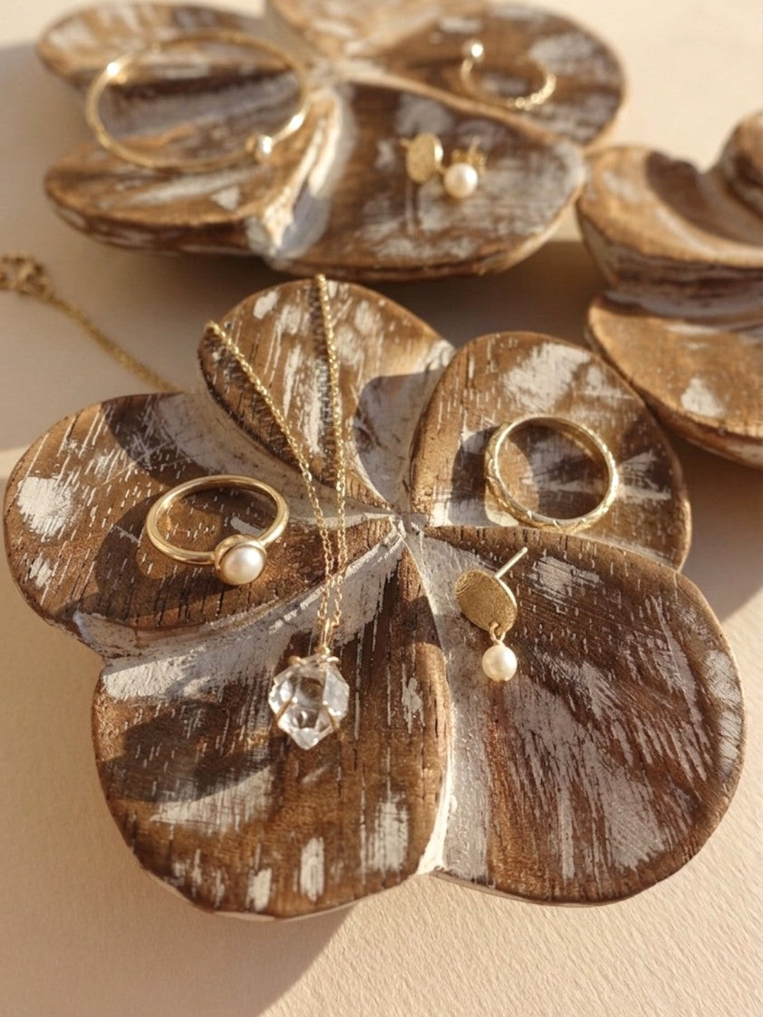 AYOMI set of 3 hand-carved brown wooden frangipani flower dishes used as decorative jewelry trays for rings and necklaces
