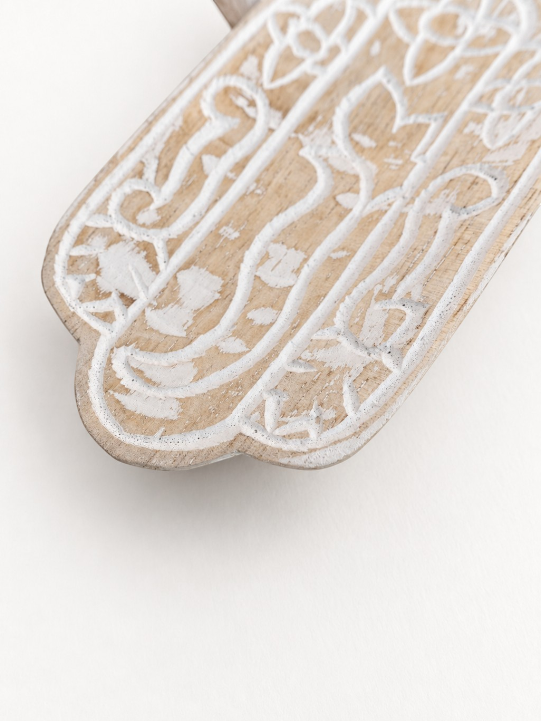 AYOMI hand-carved balsa wood Hamsa incense holder with white painted eye and floral detailing